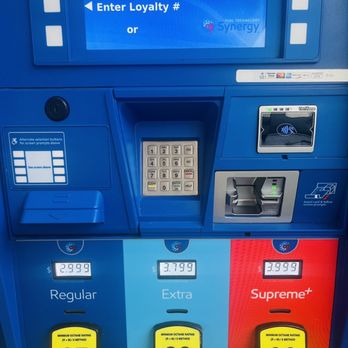 Exxon - a blue atm machine with several gas prices - Gas Stations Near Me - SANFORD, Florida Exxon - a blue atm machine with several gas prices - Gas Stations Near Me - SANFORD, Florida