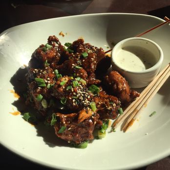 Yard House - Vegetarian "chicken" wings with firecracker sauce - New American Near Me - Orlando, Florida Yard House - Vegetarian "chicken" wings with firecracker sauce - New American Near Me - Orlando, Florida