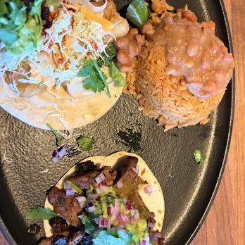 Yard House - Two tacos. The beef was good. The beer battered fish taco had a hot pepper sauce. - American Near Me - Sparks, Nevada