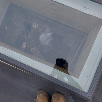 New Look Roofing - The sky light with the chucky doll in it - Roofing Near Me - Valley Stream, New York