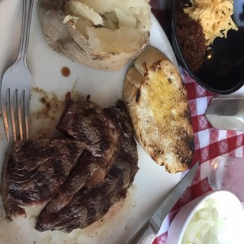 Beefmastor Inn - 8oz Ribeye, potato, onion - Steakhouses Near Me - Wilson, North Carolina