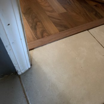 Stonemann Flooring - He cut the door frame on every door and made it look great to my ugly tile - Flooring Near Me Stonemann Flooring - He cut the door frame on every door and made it look great to my ugly tile - Flooring Near Me