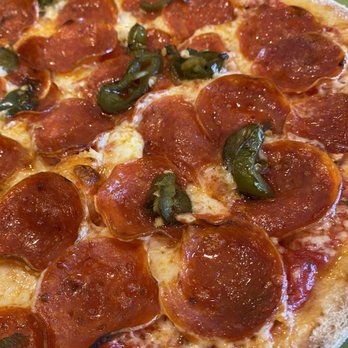 Flippers Pizza - Triple pepperoni pizza with jalapeños added - Pizza Near Me - Kissimmee, Florida Flippers Pizza - Triple pepperoni pizza with jalapeños added - Pizza Near Me - Kissimmee, Florida