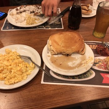 Denny's - pancakes, eggs, and hash browns on a table - Diners Near Me - New Port Richey, Florida Denny's - pancakes, eggs, and hash browns on a table - Diners Near Me - New Port Richey, Florida