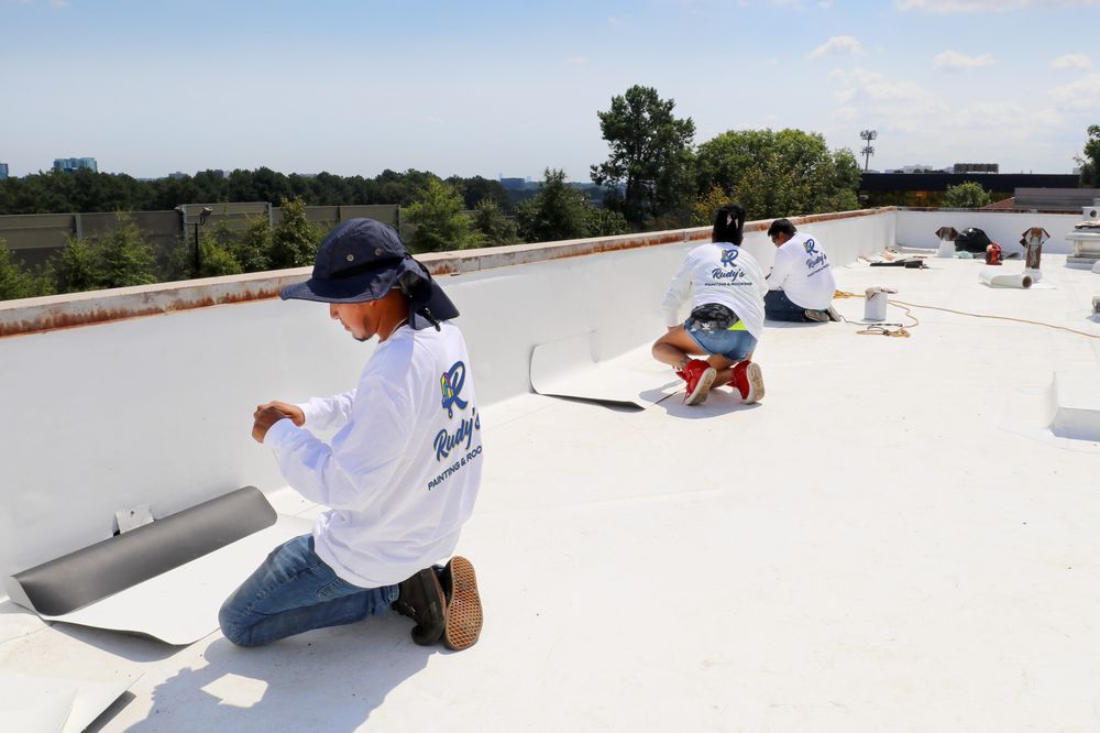 Slide of Rudy's Painting and Roofing