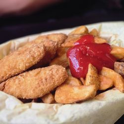 Hodad's - Four piece chicken tenders. $6 + $4.50 fries add on