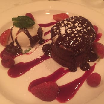 Oceano Bistro - Chocolate lava cake with vanilla ice cream - Seafood Near Me - Clayton, Missouri Oceano Bistro - Chocolate lava cake with vanilla ice cream - Seafood Near Me - Clayton, Missouri