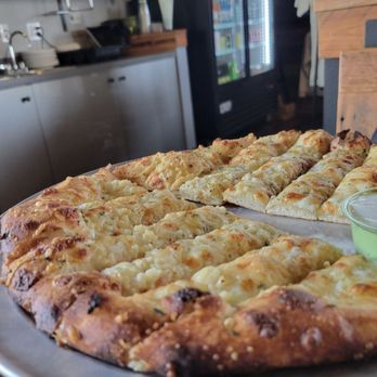 Zeeks Pizza - The appetizer has arrived. Breadsticks! - Pizza Near Me - Bellingham, Washington Zeeks Pizza - The appetizer has arrived. Breadsticks! - Pizza Near Me - Bellingham, Washington