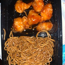 Orange chicken with lo mein, already ate most of it! Orange chicken with lo mein, already ate most of it!