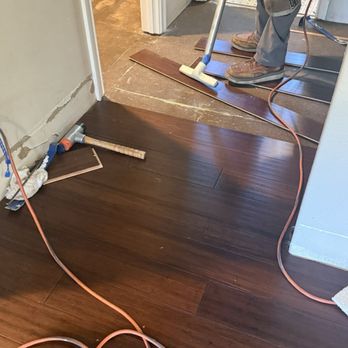 Jay Ra Hardwood Floors - Cleaning as they go - Flooring Near Me