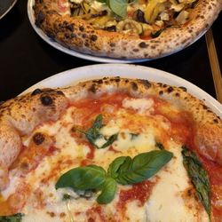 Margarita and vegetable pizza
