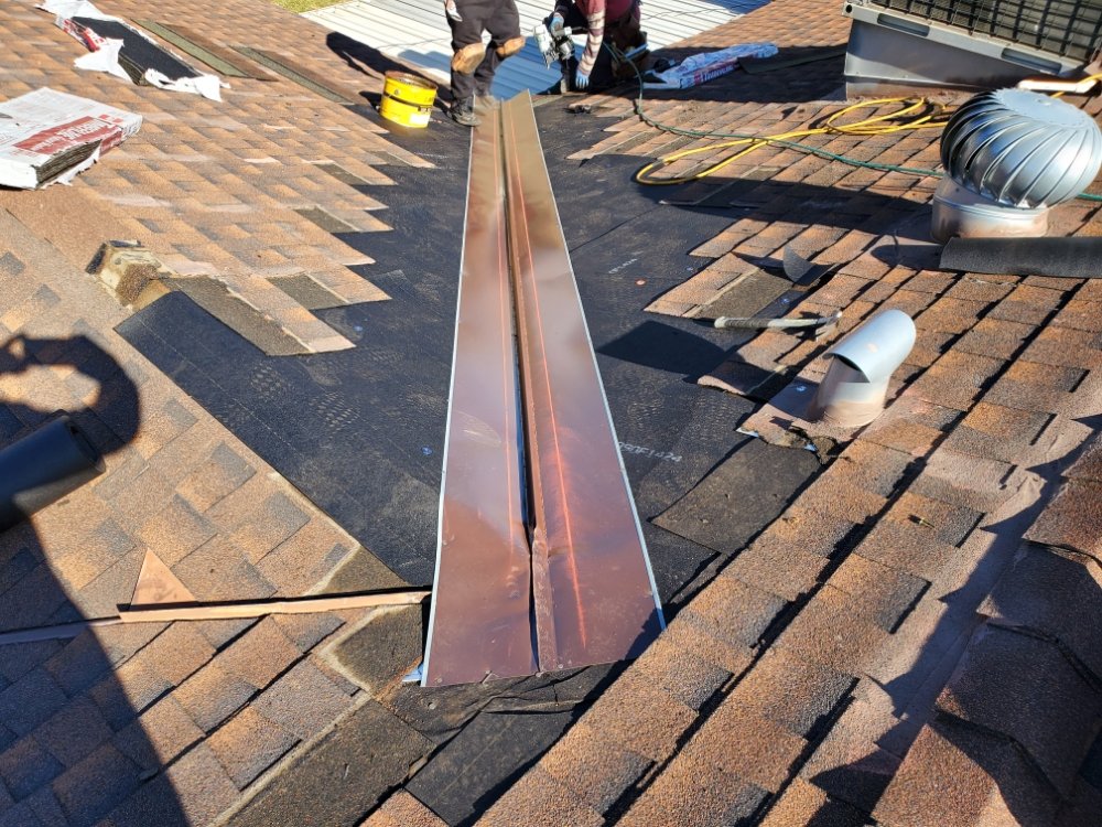 Slide of Berber-Bravo Roofing