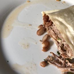 Photo of La Taqueria - San Francisco, CA, United States. Not impressed: Watery, bland regular carnitas burrito