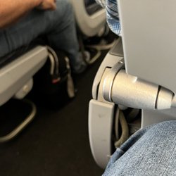 United Airlines - He figured out how to get room for his feet.