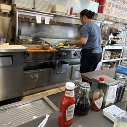 Chestnut Hill Restaurant - Flat top home fries, pancakes and omelette