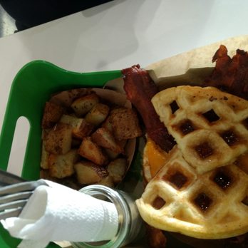 The Foxes Boxes - Bacon egg and cheddar on a waffle with roasted potatoes - New American Near Me - Wilmington, North Carolina The Foxes Boxes - Bacon egg and cheddar on a waffle with roasted potatoes - New American Near Me - Wilmington, North Carolina