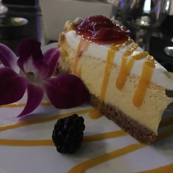 Puerto 27 Peruvian Kitchen & Pisco Bar - Mango cheesecake. So delicious. - Peruvian Near Me - Pacifica, California Puerto 27 Peruvian Kitchen & Pisco Bar - Mango cheesecake. So delicious. - Peruvian Near Me - Pacifica, California