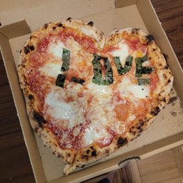 The Don Dom pizza , they made it heart shaped and wrote sweat nothing's :)