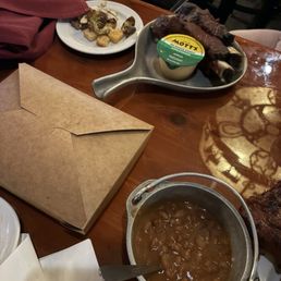 Beans, kids meal 2 beef ribs, apple sauce We asked for the remainder of our salad to go, they box it for you Beans, kids meal 2 beef ribs, apple sauce We asked for the remainder of our salad to go, they box it for you
