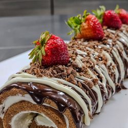 The Rustic Wagon Cafe - Fluffy Chocolate Cake Roll, with a Cream Cheese filling