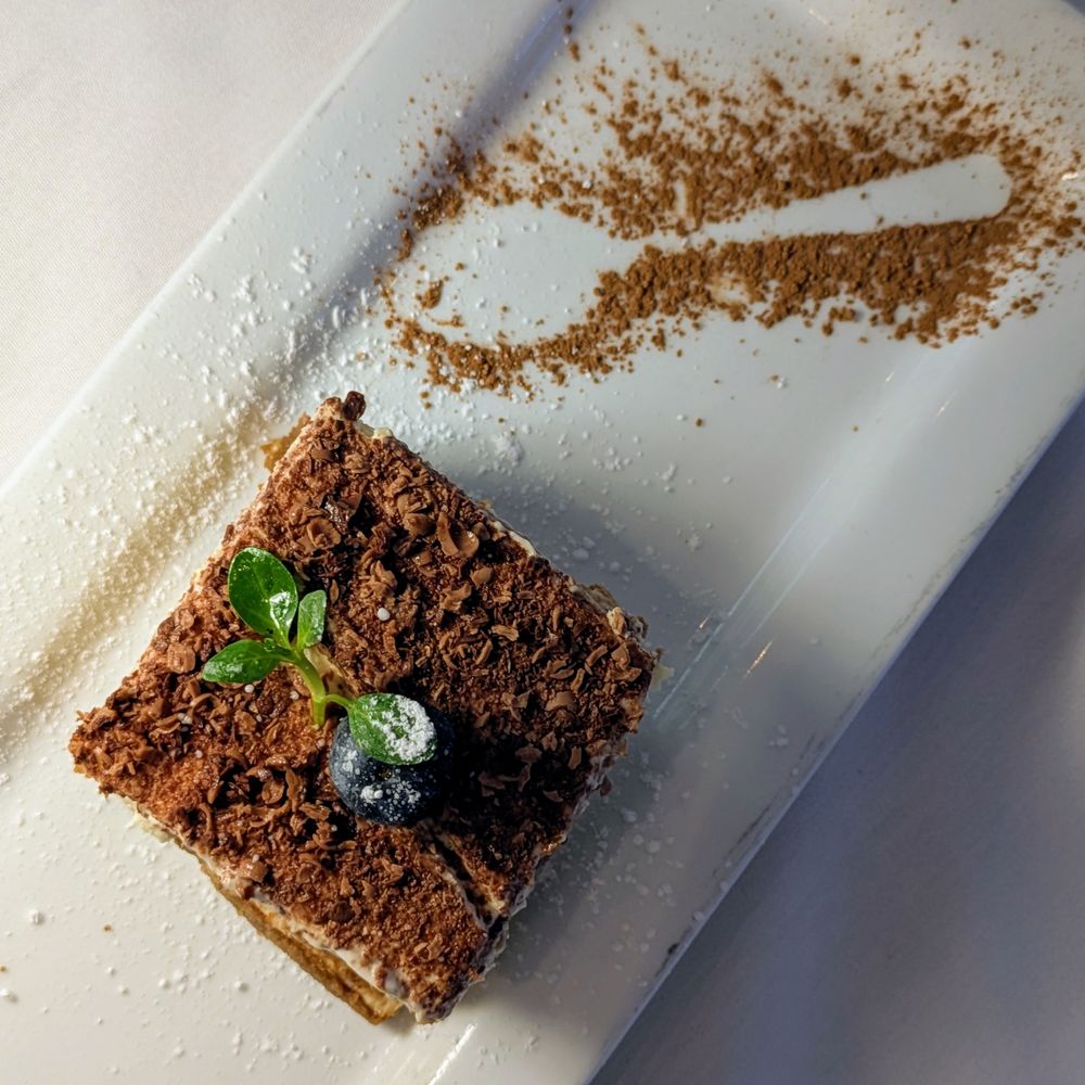 Oliver's Osteria - Tiramisú: Layered espresso-soaked cake, mascarpone cream, cacao - Italian Near Me - Laguna Beach, California