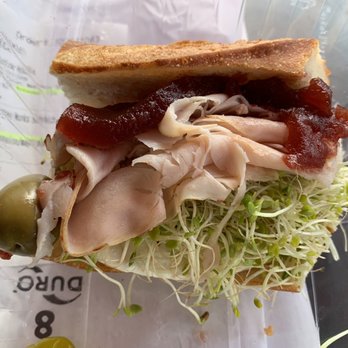 Cafe Borrone - One side of filling Turkey sandwich. - Breakfast & Brunch Near Me - Menlo Park, California Cafe Borrone - One side of filling Turkey sandwich. - Breakfast & Brunch Near Me - Menlo Park, California