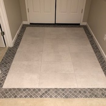 Richmond Tile Solutions - Entry Way 12x24 surrounded by mosiac tile - Tiling Near Me Richmond Tile Solutions - Entry Way 12x24 surrounded by mosiac tile - Tiling Near Me