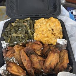 Chicken wing platter with Mac and cheese and collard greens
