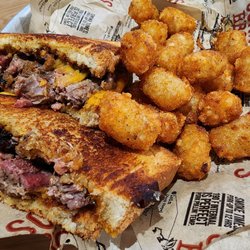 Sonny's BBQ - Brisket grilled cheese with tots