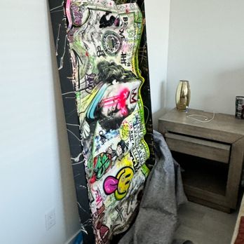 Florida Coast Moving - Expensive artwork, being prepared for blanketed, extra padded, blanketed again and wrapped. - Movers Near Me Florida Coast Moving - Expensive artwork, being prepared for blanketed, extra padded, blanketed again and wrapped. - Movers Near Me