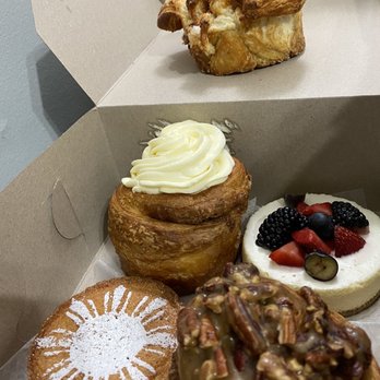 Kasama - Clockwise from top: Cardamom kuign amann, berry crème fraiche cheesecake, pecan sticky bun, ube and huckleberry Basque cake and cinnamon bun - Filipino Near Me - Chicago, Illinois Kasama - Clockwise from top: Cardamom kuign amann, berry crème fraiche cheesecake, pecan sticky bun, ube and huckleberry Basque cake and cinnamon bun - Filipino Near Me - Chicago, Illinois