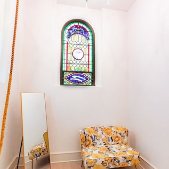 The Elliot - a living room with a stained glass window - Venues & Event Spaces Near Me - Cleveland, Ohio The Elliot - a living room with a stained glass window - Venues & Event Spaces Near Me - Cleveland, Ohio