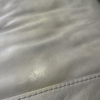 Leather Repair OC - Before - middle part of the couch - Furniture Repair Near Me