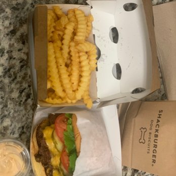 Shake Shack - Double shack burger, added pickles. Shack sauce on the side. Crinkle cut fries. Shake Shack dog biscuits! - Burgers Near Me - San Diego, California Shake Shack - Double shack burger, added pickles. Shack sauce on the side. Crinkle cut fries. Shake Shack dog biscuits! - Burgers Near Me - San Diego, California