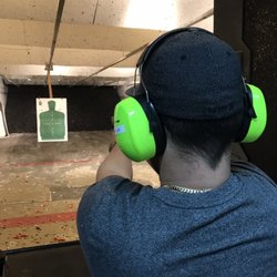 International Protective Services - At the firing range completing the course