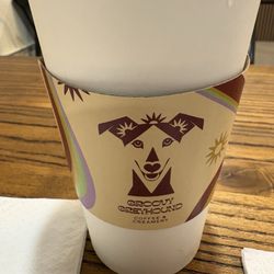 Groovy Greyhound Coffee & Creamery - Cup sleeve with shop's logo (coffee sourced from Rigby Roasters of Memphis)