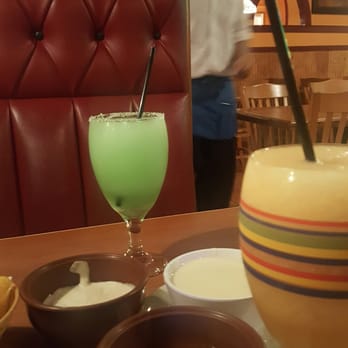 El Azteca Mexican Restaurant - The gorgeous blue drink is a Texas Margarita. The other is a delicious Peach daiquiri - Mexican Near Me - Norfolk, Virginia