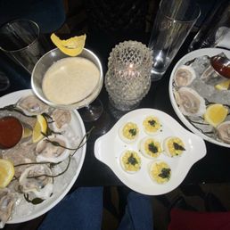 Deviled eggs with caviar, raw oysters, espresso martini Deviled eggs with caviar, raw oysters, espresso martini