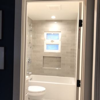 Rojas Construction & Remodeling - Guest bathroom with new bathtub, tile, toilet, canned lights and vent. - General Contractors Near Me - Walnut Creek, California Rojas Construction & Remodeling - Guest bathroom with new bathtub, tile, toilet, canned lights and vent. - General Contractors Near Me - Walnut Creek, California