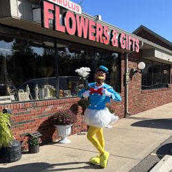 Romulus Flowers & Gifts - Humiliating lost bet, silly donald duck costume
