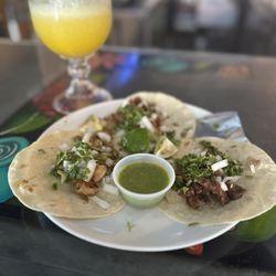 Tacos, Tequila, and Rum - Grilled chicken, steak, and pastor taco
