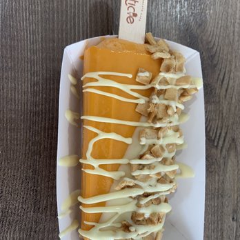 Dipsticle - Thai tea dipped in white chocolate with waffle cone - Gelato Near Me - Cordova, Tennessee Dipsticle - Thai tea dipped in white chocolate with waffle cone - Gelato Near Me - Cordova, Tennessee
