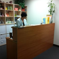 Acupuncture and Herb Medicine Clinic - Dr. Sue working in clinic
