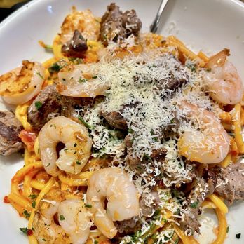 Olive Garden Italian Restaurant - Steak & Shrimp Calabrian Bucatini Pasta - Italian Near Me - Bowie, Maryland Olive Garden Italian Restaurant - Steak & Shrimp Calabrian Bucatini Pasta - Italian Near Me - Bowie, Maryland