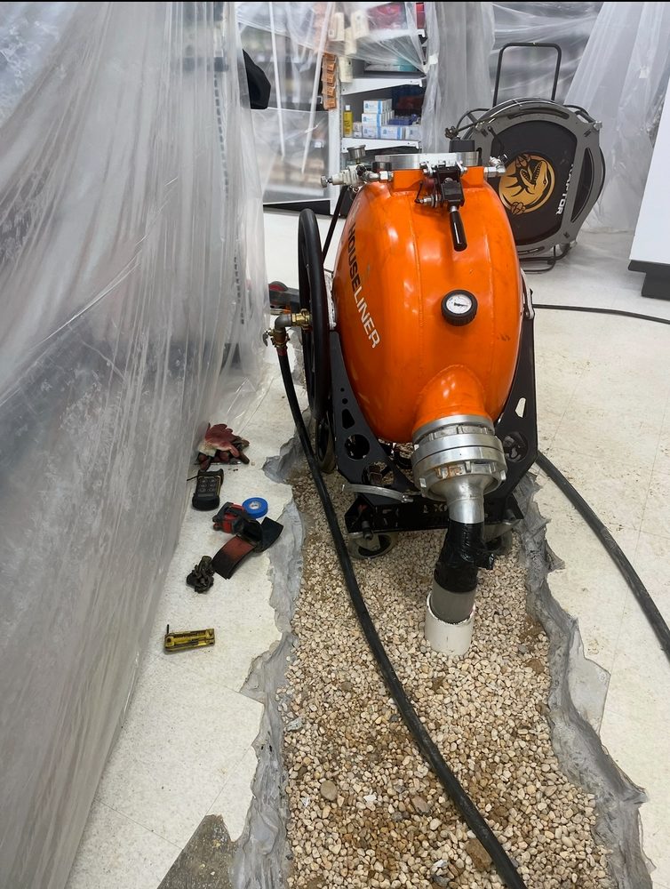 Slide of The Drain Guys