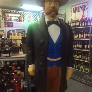 M & T Liquors - a statue of a man in a suit and hat - Beer, Wine & Spirits Near Me - Brunswick, Georgia M & T Liquors - a statue of a man in a suit and hat - Beer, Wine & Spirits Near Me - Brunswick, Georgia