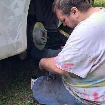 Helping Hands - working on a 2018 kia forte rear breaks - Auto Repair Near Me - Enfield, New Hampshire