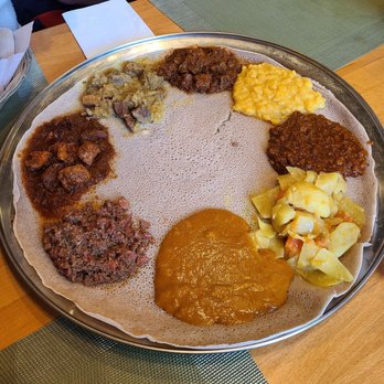 Elfegne Ethiopian Cuisine - Mehaberawi (Mesir, Ater, Shiro, Gomen; Key Wot, Alicha Wot, Doro Wot, Kitfo) - Ethiopian Near Me - Washington, DC, District of Columbia Elfegne Ethiopian Cuisine - Mehaberawi (Mesir, Ater, Shiro, Gomen; Key Wot, Alicha Wot, Doro Wot, Kitfo) - Ethiopian Near Me - Washington, DC, District of Columbia