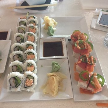 Squid Ink - From left to right - California roll, spicy crab roll, and dirty rockstar roll - Sushi Bars Near Me - Peoria, Arizona Squid Ink - From left to right - California roll, spicy crab roll, and dirty rockstar roll - Sushi Bars Near Me - Peoria, Arizona