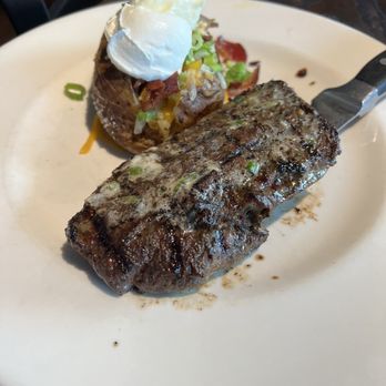 Local Goat - Ribeye with baked potato - New American Near Me - Pigeon Forge, Tennessee